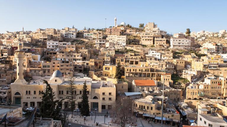 View of the old city centre of Salt, Jordan, at sunset.