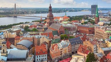 A view over central Riga, Latvia, with Riga Cathedral and Daugava River in the background.