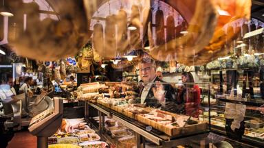 Reference: STC0044206..Schweiz. ganz natuerlich.                                             Dany Stauffacher, der Gruender des Gourmet-Festivals Sapori Ticino lockt jedes Jahr die weltbesten Koeche nach Lugano. Hier im Feinkost-Geschaeft Gabbani...Switzerland. get natural. .Every year, Dany Stauffacher, the founder of the gourmet festival Sapori Ticino, attracts the world's best cook to Lugano. Here in the delicatessen Gabbani...Suisse. tout naturellement. .Chaque annee, Dany Stauffacher, fondateur du festival gastronomique Sapori Ticino, attire les meilleurs cuisiniers du monde a Lugano. Ici, dans la charcuterie Gabbani...Copyright by: Switzerland Tourism - By-Line: swiss-image.ch/Markus Buehler