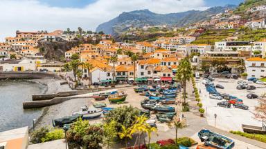 CÃ¢mara de Lobos literally, 'chamber of the wolves' is a municipality, parish and city in the south-central coast of the island of Madeira. Technically a suburb of the much larger capital city of Funchal, it is one of the larger population centres and an extension of the Funchal economy.