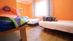 hotel_spanje_pyreneeen_prullans_cerdanya ecoresort_appartement populina_slaapkamer_losse bedden_hotel