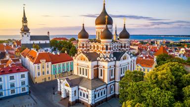 aerial view of Alexander Nevsky cathedral and St Mary's Cathedral at sunset in Tallinn, Estonia