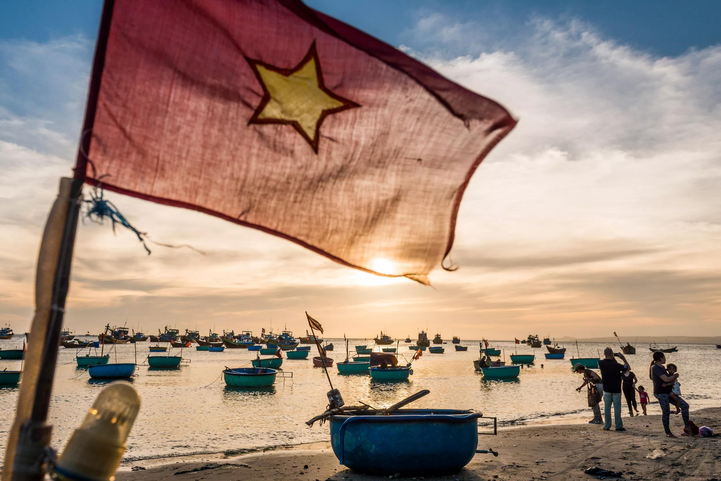 Phan Thiet, Vietnam, November 2016. Fishermen prepare for the catch of the day on the beach of Phan Thiet, which is the largest fish sauce producer of Vietnam. Phan Thiet is a quiet beach resort town on the South China sea. Vietnam is a popular Asian travel destination for tourists and travelers. Photo by Frits Meyst / MeystPhoto.com