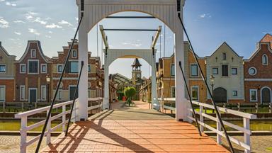 Chain bridge in the old europe town. Sunny day in Europe town