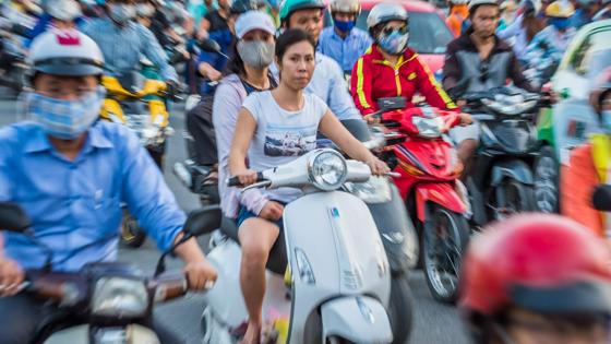 Ho Chi Minh City. Vietnam, November 2016. Crazy traffic with motorbikes and scooters in the center of former Saigon, now called Ho Chi Minh City. Vietnam is a popular Asian travel destination for tourists and travelers. Photo by Frits Meyst / MeystPhoto.com