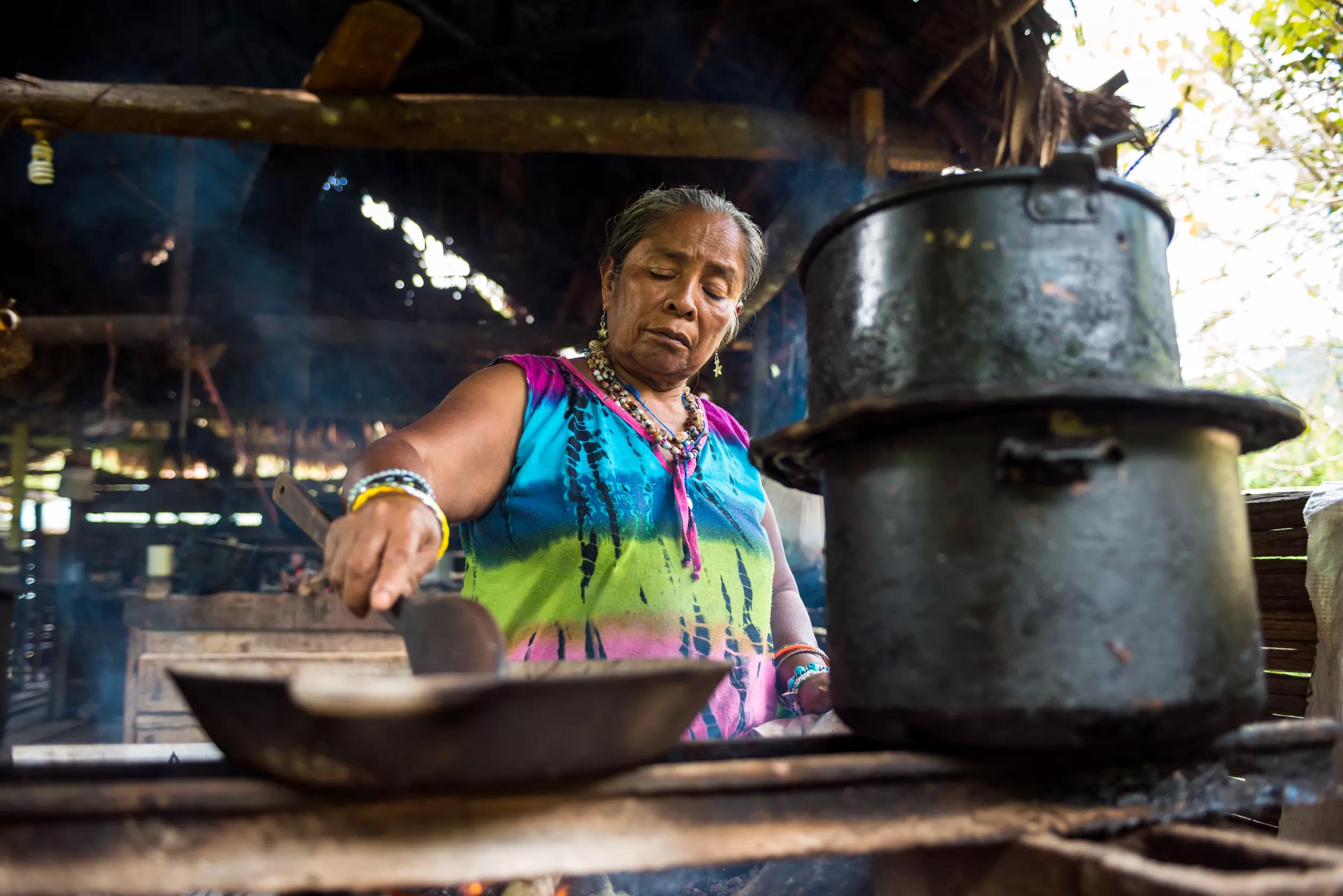 Costa Rica, February 2015. For hundreds of years, the Bri Bri indigenous people of southeastern Costa Rica have been making chocolate using traditional techniques for healing and purification purposes. A tour takes you through much of the Bri Bri Reserve, beginning with a trek across a hanging bridge to visit the homes of tribe members and learn about their history,  after which visitors head to the cacao house to will learn about the chocolate making process and how chocolate has been used by the Bri Bri for more than 300 years. Costa Rica is bestowed with an intense array of biodiversity and environmental attractions - majestic volcanoes, misty cloud forests, stunning river valleys, and hundreds of beaches along the Pacific and Caribbean coasts. Photo by Frits Meyst / MeystPhoto.com