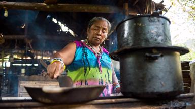 Costa Rica, February 2015. For hundreds of years, the Bri Bri indigenous people of southeastern Costa Rica have been making chocolate using traditional techniques for healing and purification purposes. A tour takes you through much of the Bri Bri Reserve, beginning with a trek across a hanging bridge to visit the homes of tribe members and learn about their history,  after which visitors head to the cacao house to will learn about the chocolate making process and how chocolate has been used by the Bri Bri for more than 300 years. Costa Rica is bestowed with an intense array of biodiversity and environmental attractions - majestic volcanoes, misty cloud forests, stunning river valleys, and hundreds of beaches along the Pacific and Caribbean coasts. Photo by Frits Meyst / MeystPhoto.com