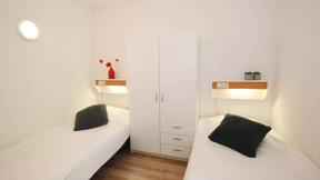 Nederland_Epe_RCN_Vakantiepark_De_Jagerstee_Bosbungalow_Het_Edelhert_Zespersoons_Slaapkamer