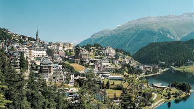 Creation Date: 09/07/2003.Reference: STS0169.Title: SWITZERLAND.GET NATURAL..Caption: Switzerland. get natural..St. Moritz (1822 m) in the Upper Engadin, Graubuenden. View onto St. Moritz and its lake. In the backgroud Muottas Muragl, a panoramic excursion goal...Schweiz. ganz natuerlich..St. Moritz (1822 m) im Oberengadin, Graubuenden. Blick ueber St. Moritz-Dorf auf den See. Im Hintergrund der Aussichtsberg Muottas Muragl...Suisse. tout naturellement..St-Moritz (1822 m) en Haute-Engadine, Grisons. Vue sur le lac et St-Moritz-Dorf. Au fond, la montagne panoramique de Muottas Muragl...Copyright by Switzerland Tourism By-line:.swiss-image.ch/Lucia Degonda..Signature: Lucia Degonda.Library: Tourismus_Schweiz.Credit: Switzerland Tourism.Created Date: 20030907
