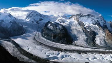 Reference: STS3070.Title: SWITZERLAND - SUMMER.Caption: Switzerland. get natural. .Panorama view from the Gornergrat high above Zermatt, Valais: to the left Monte Rosa with Dufourspitze (4,634 m), in the center Liskamm (4,527 m), to the right Breithorn (4,164 m), in front the Gorner Glacier. ..Schweiz. ganz natuerlich. .Panorama-Aussicht vom Gornergrat oberhalb Zermatt, Wallis: links Monte Rosa mit Dufourspitze (4634 m), mitte Liskamm (4527 m), rechts Breithorn (4164 m), davor der Gornergletscher. ..Suisse. tout naturellement. .Vue panoramique depuis le Gornergrat au-dessud de Zermatt dans le Valais: a gauche, le Mont Rose avec le Dufourspitze (4634 m), au centre, le Liskamm (4,527 m), a droite, le Breithorn (4164 m), au premier plan, le glacier du Gorner. ..Copyright by: Switzerland Tourism By-Line: swiss-image.ch/Marcus Gyger