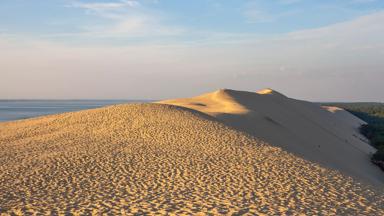 frankrijk_aquitanie_gironde_dune-du-pilat_duin-zand-zee-zonsondergang_getty