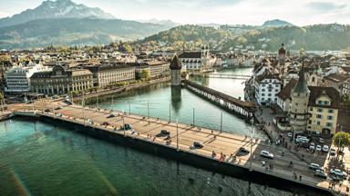 Reference: STS9063.Schweiz. ganz natuerlich.                                              Stadtpanorama mit Pilatus, Kappelbruecke und Guetsch...Switzerland. get natural. .City panorama with Pilatus, Chapel Bridge, and Guetsch...Suisse. tout naturellement. .Panorama de la ville avec Pilatus, Pont de la Chapelle, et Guetsch...Copyright by: Switzerland Tourism - By-Line: swiss-image.ch/Ricardo Perret.