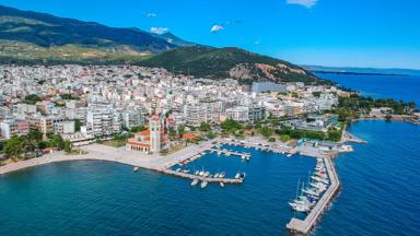 Aerial panoramic view of Volos city, Greece at sunset