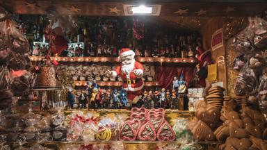 This is a photo of a beautiful Christmas market stall in a German Christmas market. The stall sells traditional German Christmas cookies.